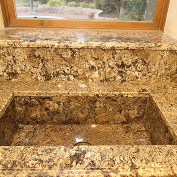 Coliseum kitchen with custom granite sink and Ogee edge
