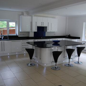 Collection of our fine painted kitchens and one modern sleek kitchen