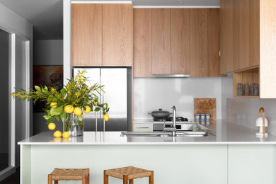 Mid-century modern kitchen photo in Melbourne