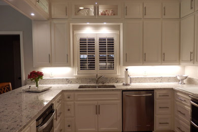 Kitchen photo in Birmingham with granite countertops, stainless steel appliances and an undermount sink