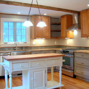 Colonial Farmhouse Restoration - new kitchen with antique ceiling beams