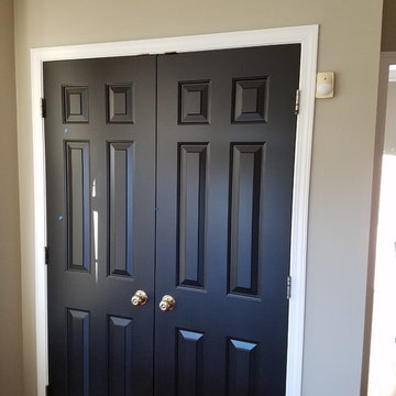 Color Consulting changing doors from white to black and golden oak rail to black