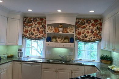 Kitchen - traditional kitchen idea in Bridgeport with white cabinets
