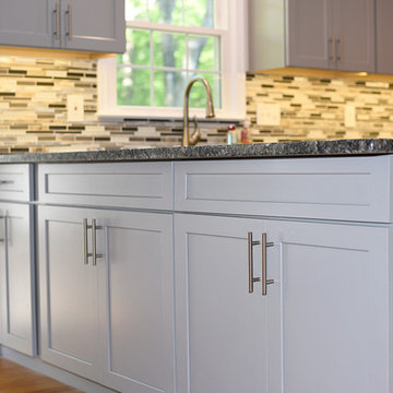 Complete Kitchen Remodel with Gray Shaker Cabinet and dark countertop