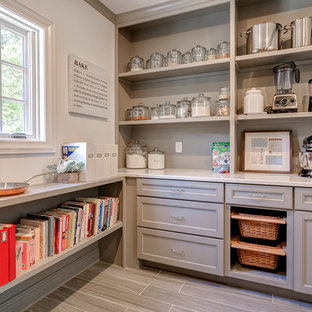 Large transitional kitchen pantry in Columbus with recessed-panel cabinets, grey cabinets, grey splashback and porcelain floors.
