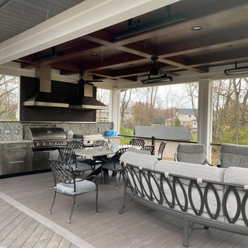 Composite Deck, Covered Outdoor Kitchen Oasis with Vertical Aluminum Railing