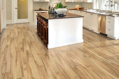 Minimalist laminate floor and beige floor kitchen photo