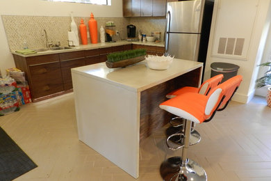 Example of a trendy kitchen design in Houston with concrete countertops