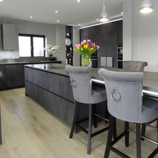 Concrete Graphite kitchen with secret doors