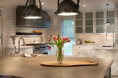 Example of an eclectic kitchen design in Philadelphia with concrete countertops