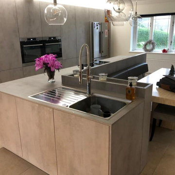 Concrete kitchen with L shaped island