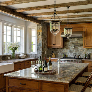 Large traditional open concept kitchen designs - Inspiration for a large timeless u-shaped medium tone wood floor and brown floor open concept kitchen remodel in Bridgeport with a farmhouse sink, shaker cabinets, medium tone wood cabinets, granite countertops, gray backsplash, stone tile backsplash, stainless steel appliances and an island