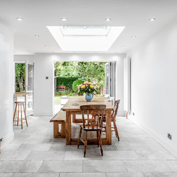 Contemporary And Colour Matching Dining Room With Outdoor Extension in Liverpool
