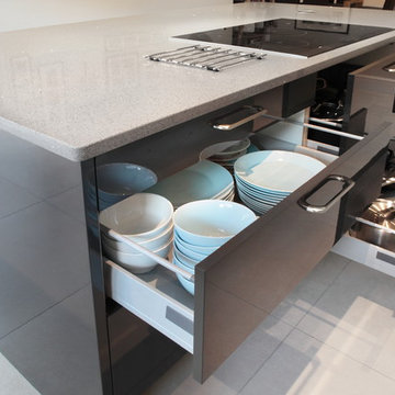 Contemporary cashmere & grey kitchen with a variety of storage
