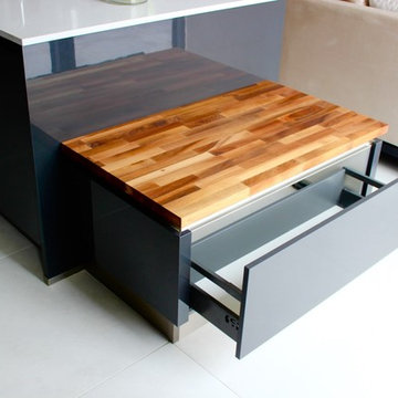 Contemporary dark grey kitchen with clever storage options