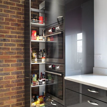 Contemporary dark grey kitchen with tall storage units