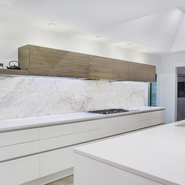 Contemporary Dolce Vita Kitchen with Waterfall Island