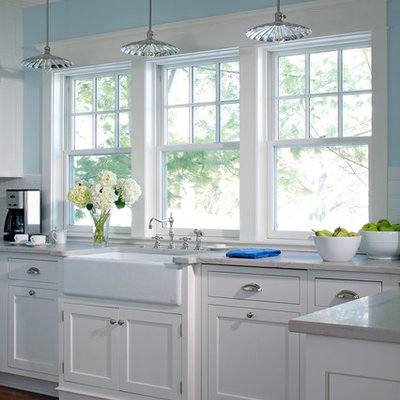 Kitchen - small country kitchen idea in Other with white cabinets, quartzite countertops and a farmhouse sink