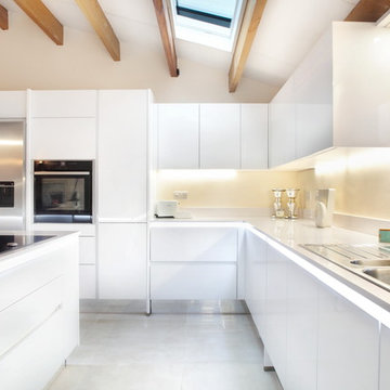 Contemporary handle-less white kitchen