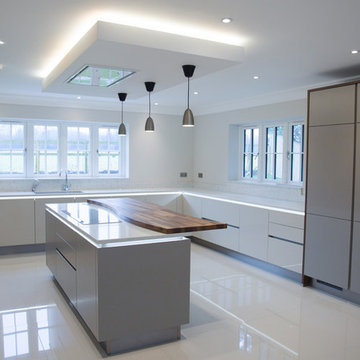 Contemporary high gloss cashmere & matt taupe kitchen