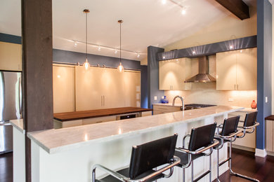 Eat-in kitchen - mid-sized contemporary eat-in kitchen idea in Chicago with two islands