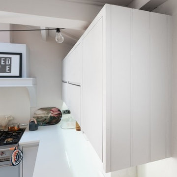 Contemporary In-Frame Slab Front Kitchen in Sawbridgeworth