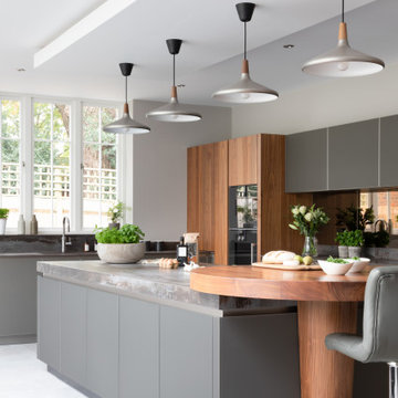 Contemporary Intuo Matt Glass Kitchen with Bespoke Additions