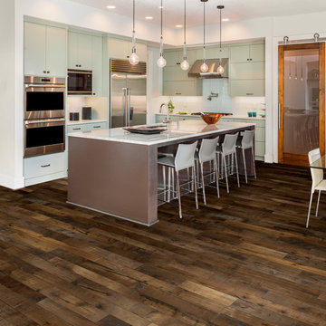 Contemporary kichen with organic wood floors.
