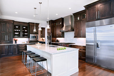 Inspiration for a contemporary kitchen remodel in Denver with flat-panel cabinets and brown cabinets