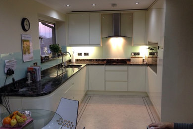 This is an example of a modern kitchen in Kent.