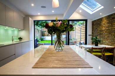 Inspiration for a large contemporary single-wall kitchen in London.