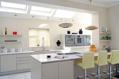Design ideas for a large contemporary kitchen in London with an island.