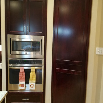 Contemporary kitchen remodel with custom burgundy stain
