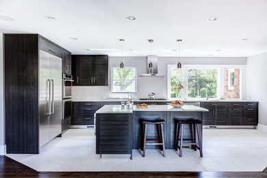 Example of a large trendy white floor eat-in kitchen design in New York with quartzite countertops, white backsplash, porcelain backsplash and an island