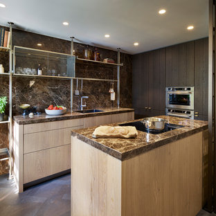 This is an example of a small contemporary galley kitchen in Oxfordshire with a submerged sink, light wood cabinets, brown splashback, marble splashback, stainless steel appliances, dark hardwood flooring, no island, brown floors and black worktops.