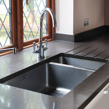 Contemporary kitchen with built in sink