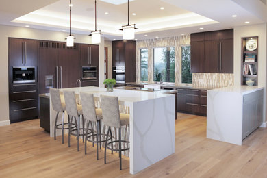 This is an example of a large modern l-shaped open plan kitchen in San Francisco with a belfast sink, flat-panel cabinets, marble worktops, beige splashback, glass sheet splashback, stainless steel appliances, light hardwood flooring and an island.