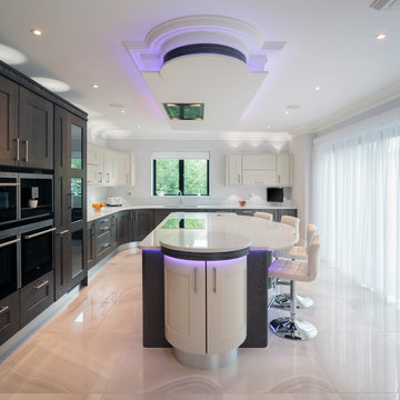 Contemporary kitchen with mixed oak frames and colour-changing LEDs