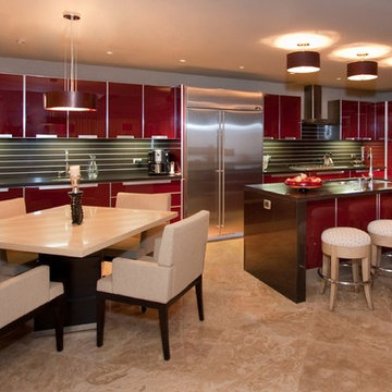 Contemporary Kitchen with Red Glass Cabinetry