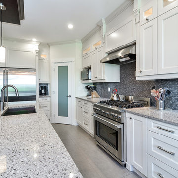 Contemporary kitchen with shaker style cabinets Vancouver