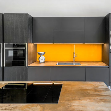 Contemporary kitchen with vibrant indian yellow