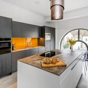 Contemporary kitchen with vibrant indian yellow