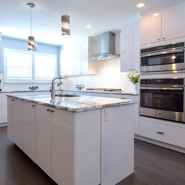 Contemporary Kitchen with white laminate doors