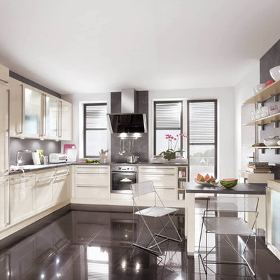 Inspiration for a contemporary kitchen remodel in Boston with paneled appliances