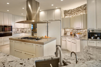 Inspiration for a contemporary eat-in kitchen remodel in Miami with flat-panel cabinets, white cabinets and an island