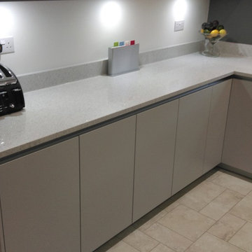Contemporary, matt grey kitchen & white quartz worktop