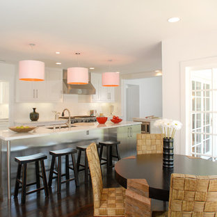 Huge contemporary eat-in kitchen designs - Inspiration for a huge contemporary l-shaped dark wood floor eat-in kitchen remodel in Los Angeles with an undermount sink, shaker cabinets, stainless steel cabinets, marble countertops, white backsplash, subway tile backsplash, stainless steel appliances and two islands