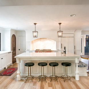 Mediterranean kitchen designs - Example of a tuscan kitchen design in Other