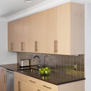 Contemporary rift cut oak flat panel kitchen