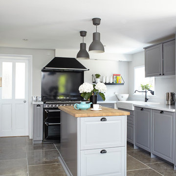 Contemporary-styled grey shaker kitchen